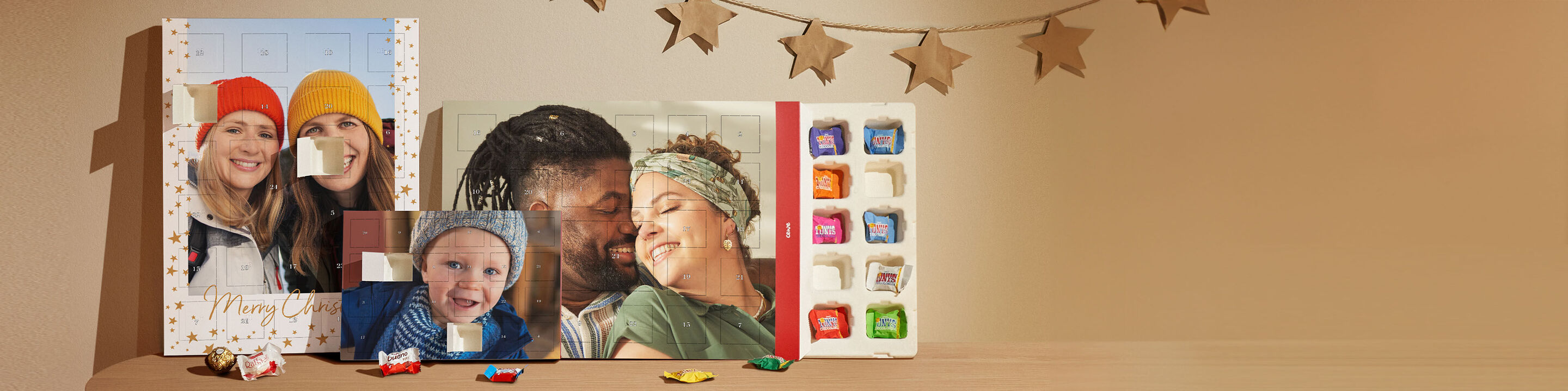 A loving photo book and various design elements on a table, showing joy and creativity