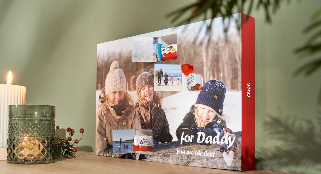 Beautiful personalized CEWE greeting cards for a father, surrounded by happy children in the snow.